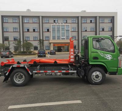 China Building Material Stores Sinotruk CDW Hot Sale Hook Arm Compression Garbage Truck for sale