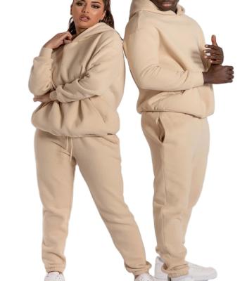 China Anti-wrinkle color unisex 100% cotton terry autumn simple pullover with opening side pockets and elastic leg hoodie pants sets for sale