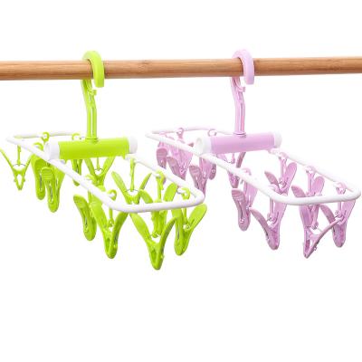 China Eco-friendly Colorful Plastic Foldable 12 Clips Towel Hanger 2022 Socks Tissue Bags Towel Hanger For Socks for sale