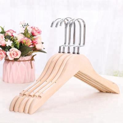 China Modern Hot Sale Coat Hangers Adult Natural Wood Solid Wood Coat Hanger With Non-slip Strips for sale