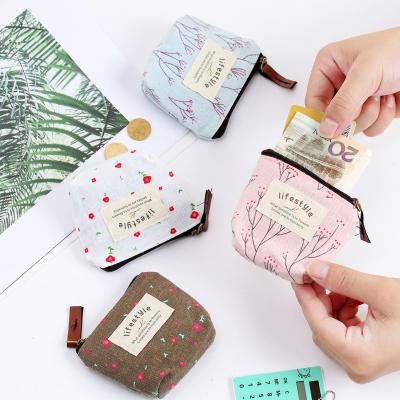 China Japanese and Korean fresh rural style small coin change cartoon canvas viable floral mini bag for sale