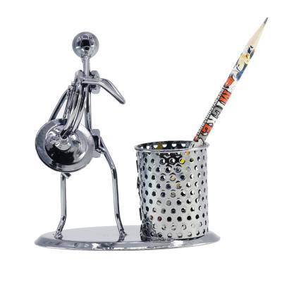 China Wholesale Europe Personality Gifts Iron Music Metal Opens Man Model Musical Instrument Pen Holder for sale