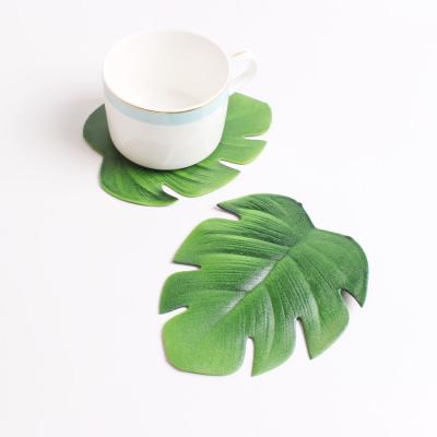 China Viable Tablecloth Simulation Christmas Monstera Palm Turtle Tropical Leaf EVA Placemat for sale