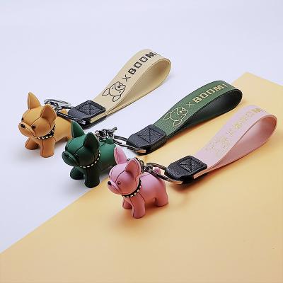 China Net Jewelry Tray Celebrity Bronzing French Rope Leather Puppy Dog Fighting Key Chain for sale