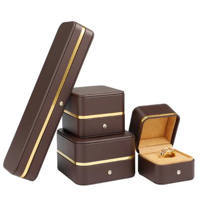 China Jewelry Display Customize Brand Jewelry Set Personalized Multi Function Storage Kasten Gift PU Brown Portable Jewelry Display Packaging Box for sale