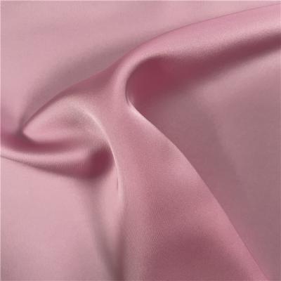 China Shiny 100% organic poly satin fabric with good hand feel fashion dyed fashion garment by design for sale