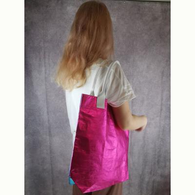 China Bolso de mujer de piel brillante de gran capacidad Bolso de mano para profesionales en azul y rojo rosa en venta