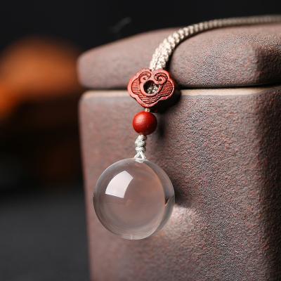 China Wholesale Clear Quartz Natural White Transparent Crystal Ball Field Discharge Grade Necklace Gift Pendant Ornaments for sale