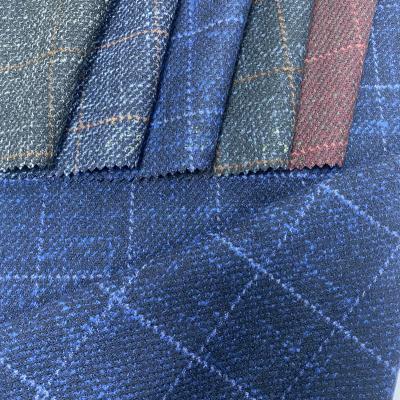 China Anti-Static Hot Selling Woven Checks Design Polyester Tweed Stretch Fabric Viscous Brushed Tweed Fabric for sale