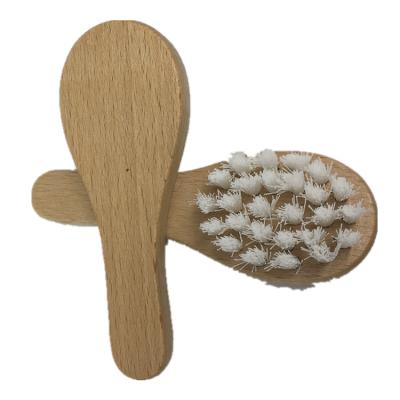 China Sustainable Tiny Wooden Baby Brush for Newborns and Toddlers for sale