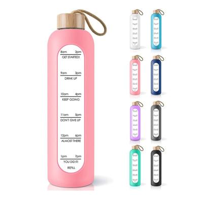 China Viable 32Oz Tumbler Calendar Vacuum Cup Large Capacity Balloon Sports Cup Motivational Glass Water Bottle With Silicone Sleeve for sale