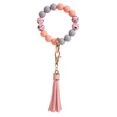 China Key Holder Silicone Key Chain For Keys Tassel Wood Beads Wristband Keychain For Women Accessories for sale