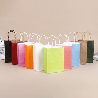 China Solid Colors Recyclable Shopping Paper Bags With Handles Custom Brown Kraft Paper Bags for sale