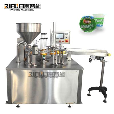 中国 Automatic Jelly Yogurt Ice Cream Juice Sugar Honey Rotary Cup Filling Capping Sealing Machine 販売のため