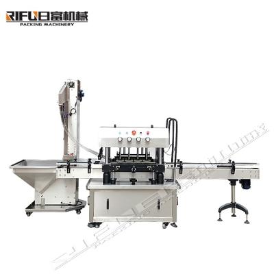 China High speed Automatic capping machine plastic screw bottle locking machine for beverage factory à venda