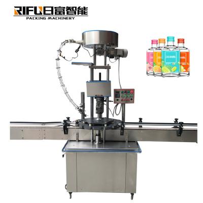 China High speed Automatic capping machine glass bottle jar capping machine for snack food factory à venda