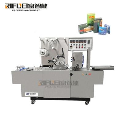 中国 Automatic cellophane wrapping machine boxes with cellophane film overapping machine transparent film 販売のため