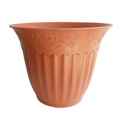 China Durable Material Classic Round Small Plastic Orange Flower Pots Plant Pots for sale