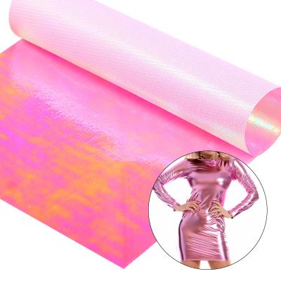 China Shiny Pink Metallic Luxury Sparkle Fabric 100 Polyester Iridescent Shiny Illusion Fabric For Evening Dresses Stage Costumes for sale