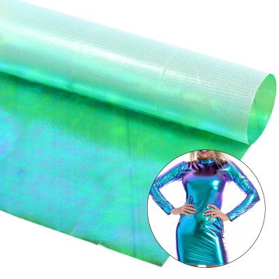 China Shiny Sparkle Fabric 100 Polyester Iridescent Green Metallic Illusion Shiny Fabric For Evening Dresses Stage Costumes for sale