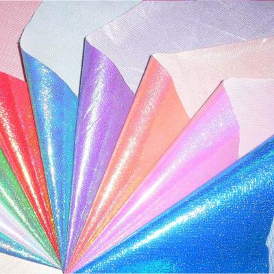 China Metallic Shiny Sparkle Illusion Rainbow Iridescent 100 Polyester Fabric For Stage Wedding Bridal Costume Evening Dresses for sale