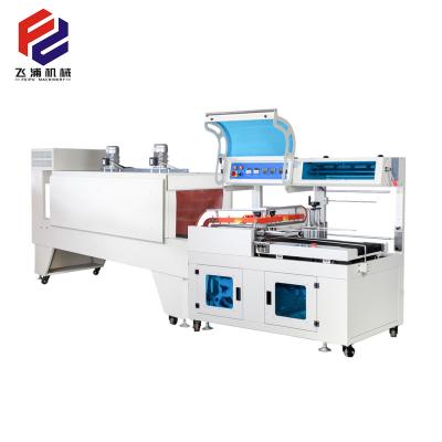 China High Speed ​​Automatic Food Heat Shrink Packing Machine Shrink Wrapping Machine Shrink Paper Wrapping Machine for sale