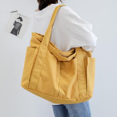 China 2020 New Korean Large Capacity One-shoulder Bag Canvas Letter Women's Diagonal Bag Eco-friendly Washing Bag for sale