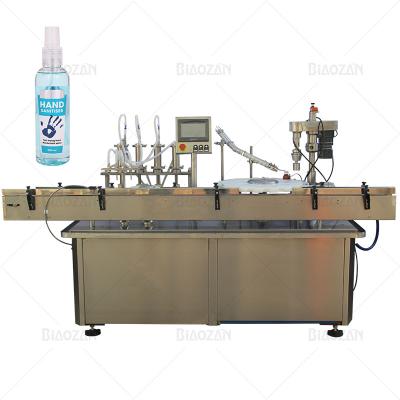 China Food Filler Equipment 4 Head Full Automatic Hand Sanitizer Bottle Filling Machine Popular for sale