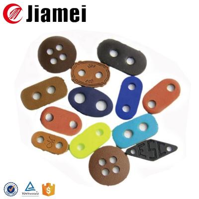 China Custom Color Cord Stopper Leather Clothing Accessories Nickel Free Tie Stoppers for sale