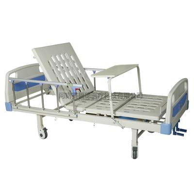 China Manual Hospital Bed 2 Cranks Hospital Bed With ABS Flip Table for sale