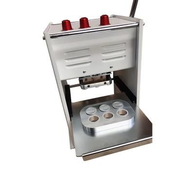 China Food Coffee Capsule Empty Manual Pressing 6 Heads Stainless Steel Sealing Machine for sale