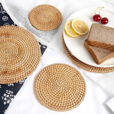 China Huangtu Saling Good Quality Heat Insulation Table Mat Natural Dining Round Woven Rattan Warm Viable Braided Place Mats for sale