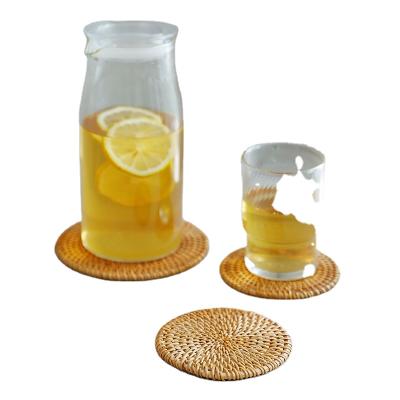 China Viable Wholesale Creative Rattan Coaster Rattan Rattan Huangtu Rattan Place Mat for sale