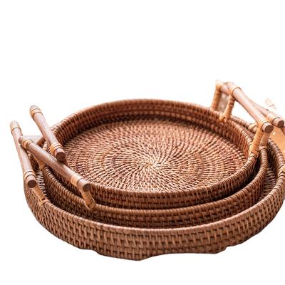 China Huangtu Sustainable Rattan Table Top Other Home Decor Round Bamboo Wooden Serving Food Square Black Nature Fruit Decorative Tray for sale