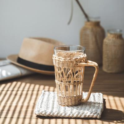 China Huangtu Hot Sale Coffee Tea Water Clear Glass Cup Viable Transparent Glass Cup Woven Cup Rattan Holder for sale