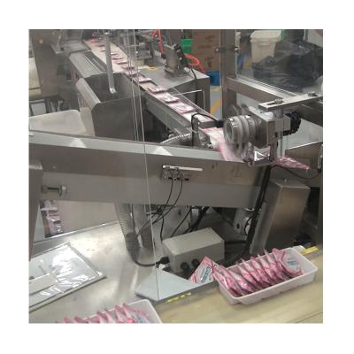 China Fully Automatic Customized High Speed ​​Tray Loading System Biscuit Food Packing Machines For Secondary Packaging for sale