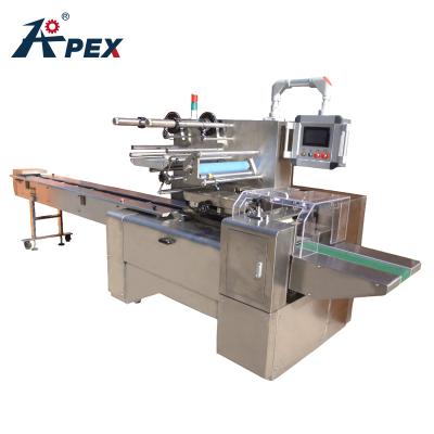 Cina Automatic Food Mult-row Over-edge Seal Topping Machine Biscuit Chocolate Cookie Packing Machine in vendita