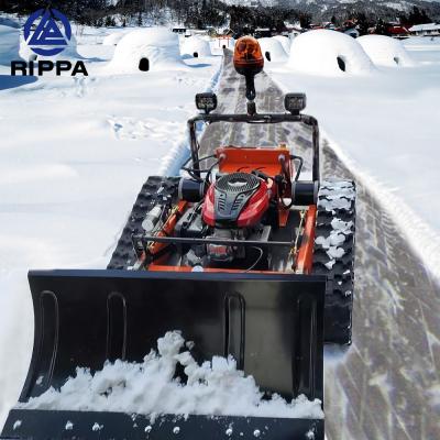 China Rippa Cheap Garden Electric Remote Control Robot Lawn Mower With Snow Blower Thrower Plow for sale