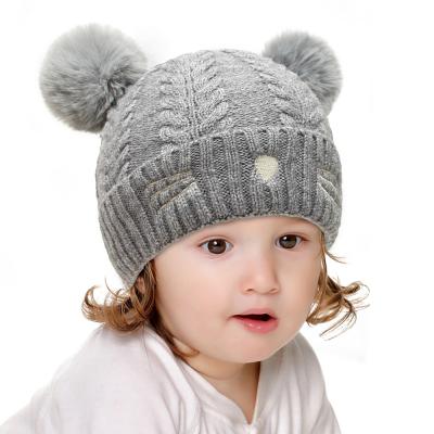 China COMMON Promotional New Product Cat Embroidery Kids Winter Pom Pom Beanie Hats for sale