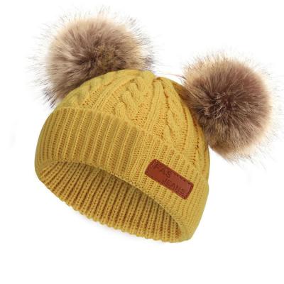 China Head Cold Weather Soft and Warm Knit Beanie Wholesale Double Pom Pom Baby Winter Hat Cap for sale