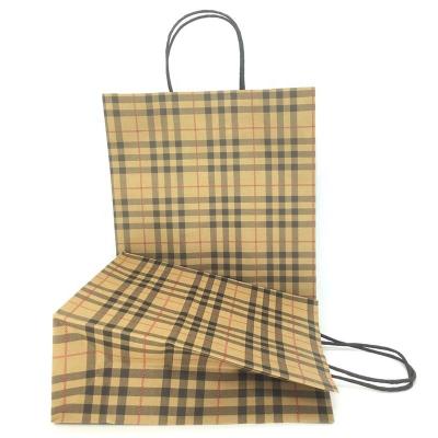 China Luxury Custom Waist Packing Materials Paper Bag Recycled Paper Kraft Paper Shopping Bag With Twisted Handle for sale