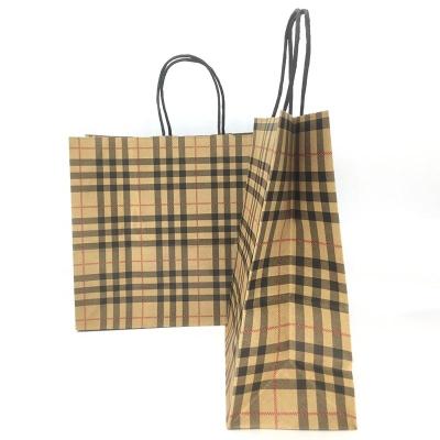 China Recycled Materials Wholesale Luxury Shoes Clothes Shopping Kraft Paper Bag With Logo Gift Bag Packaging for sale