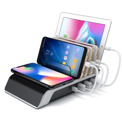 China 5in1 Tablet Desktop Charging Station Multi Charger Dock Organizer Stand with 4USB Ports for iPhone Wireless Charger Pad for sale