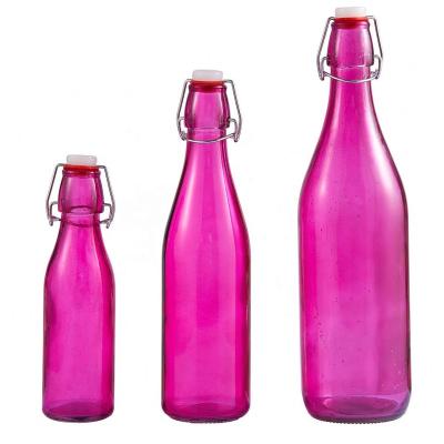 China Aeofa 500ml 1L Viable Glass Water Bottles With Decoration Sprayed Color And Hand Painted Lines Christmas Bottle Metal Glitter Clip for sale