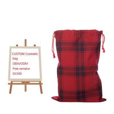 China Custom Large Size Christmas Presents Gift Bags Reusable Fabric Storing Storage Bags Red and Black Buffalo Plaid Drawstring Bags for sale