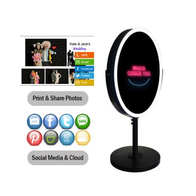 China Indoor Easy Detachable Portable Oval Mirror Photo Magic Booth With Flight Case for sale