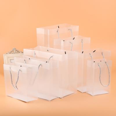 China Recycled Materials PVC Exquisite Classic Durable Environmental Transparent Gift Bag Transparent Shopping Bag for sale