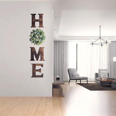 China Europe Rustic Wall Hanging Wooden Home Sign With Artificial Eucalyptus Wreath Decorative Wooden Home Letters for sale