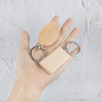 China Customized Empty Wooden Key Chain DIY Wooden Blank Wooden Key Chain for sale