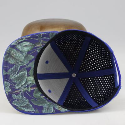 China Fluorescence JOINT Royal Blue Custom Under Print Perforated Brim Snapback Hat Cap for sale